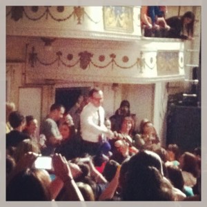 Donnie jumps into the audience.